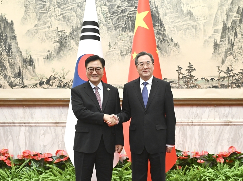 丁薛祥分别会见老挝人民革命党中央总书记、国家主席通伦和韩国国会议长禹元植「相关图片」