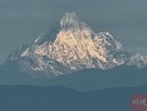 今晨，成都推窗见雪山！